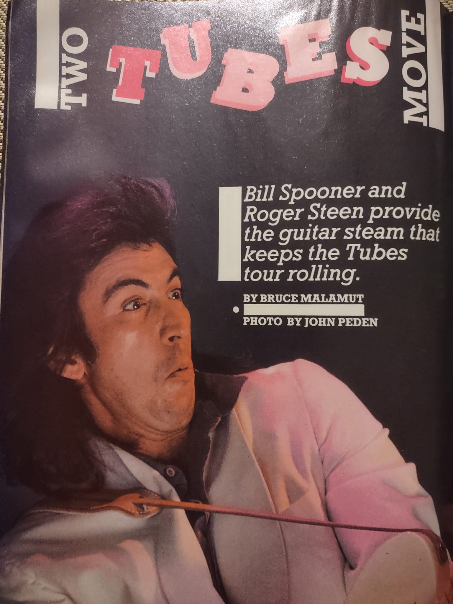Magazine spread — 'Two Tubes Move': Bill Spooner and Roger Steen provide the guitar steam that keeps the Tubes tour rolling, by Bruce Malamut, photo by John Peden