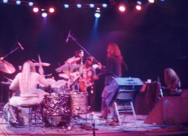 The Tubes live in color — Prairie Prince on drums, Re Styles dancing, purple stage lights