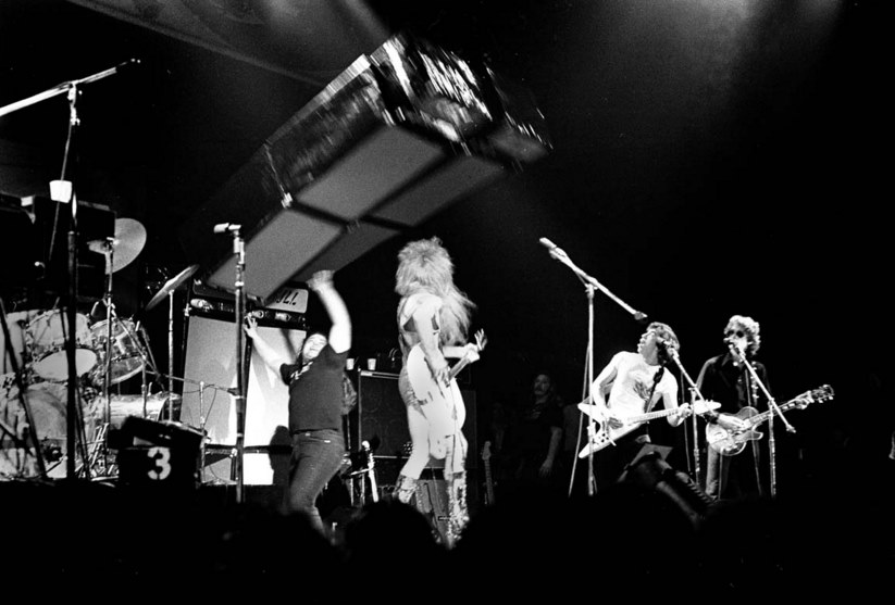 The Tubes live — a stage sign appears to tip, Fee mid-performance