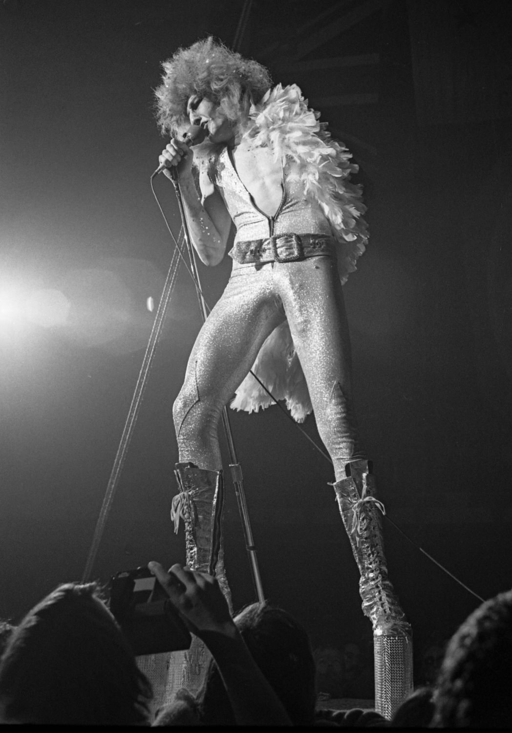 Fee Waybill as Quay Lewd — platform boots, feather boa