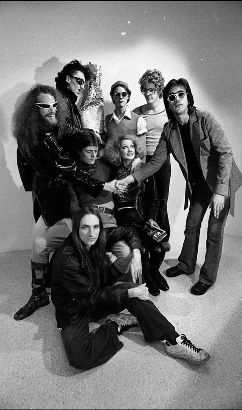 The Tubes group portrait — nine people piled together in a San Francisco studio shoot