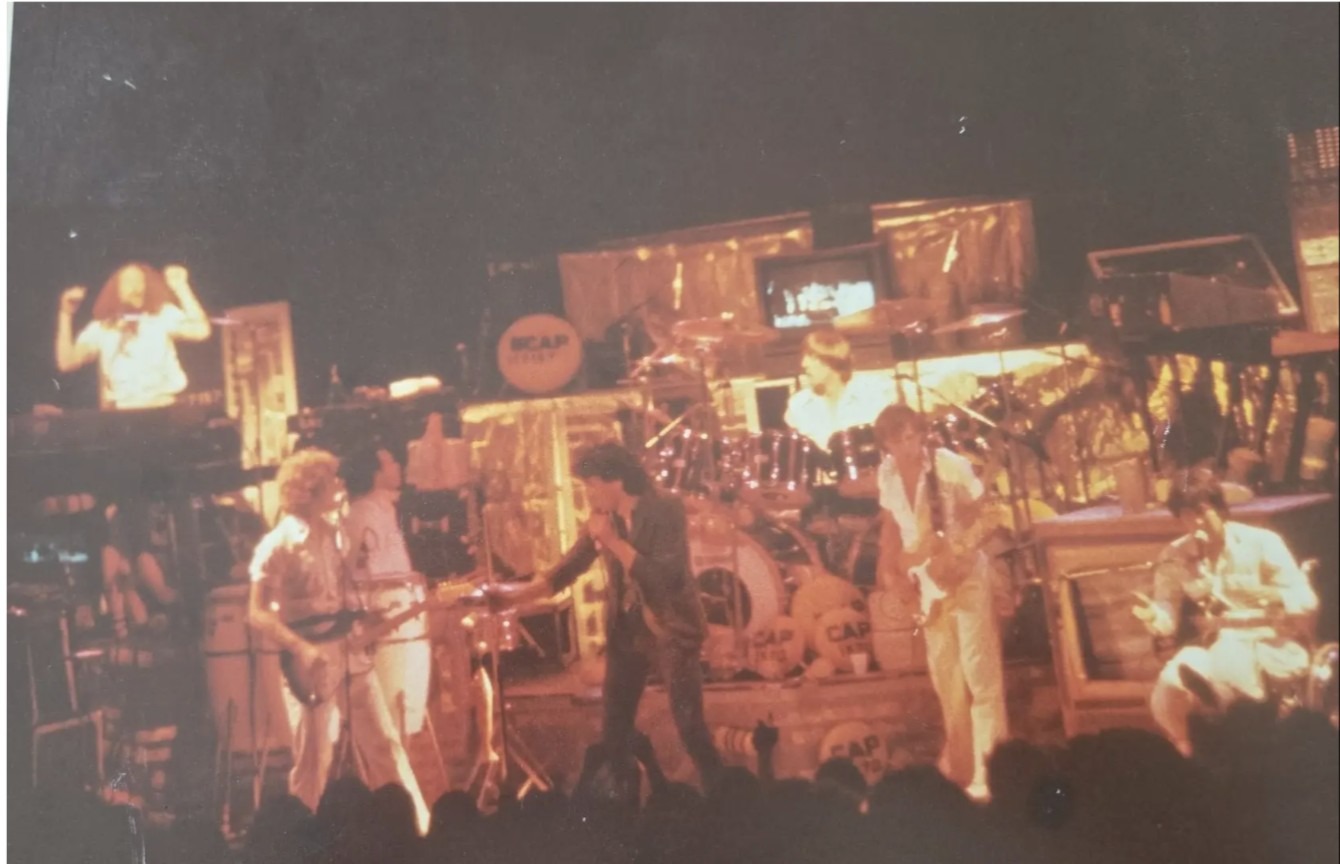 The Tubes full band on stage with Capitol Records branding