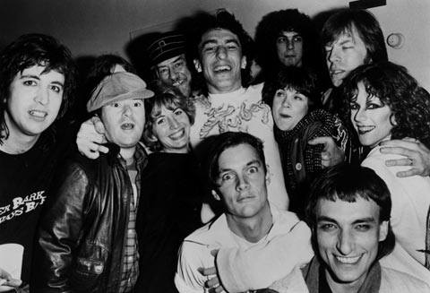 The Tubes in a crowded backstage group photo — Bill Spooner, Fee Waybill, Roger Steen and others crammed in frame, black and white